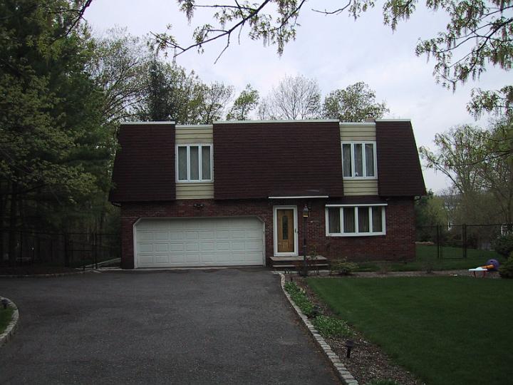 Front.JPG - Front of the house. Driveway 160'